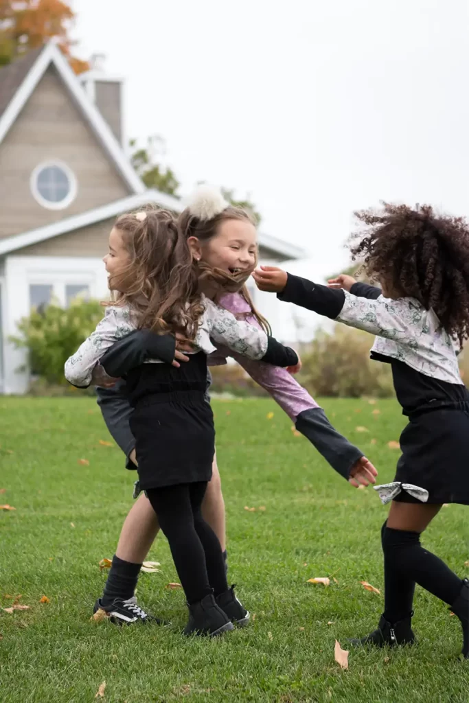 Candid portrait of children playing at a family gathering